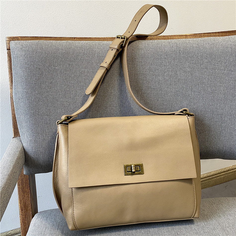 真皮轻奢邮差包包女斜挎包高级感ol通勤包大容量休闲气质上班包包