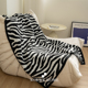 高级感毯子斑马纹现代简约针织毯办公室盖毯空调毯单人沙发搭毯