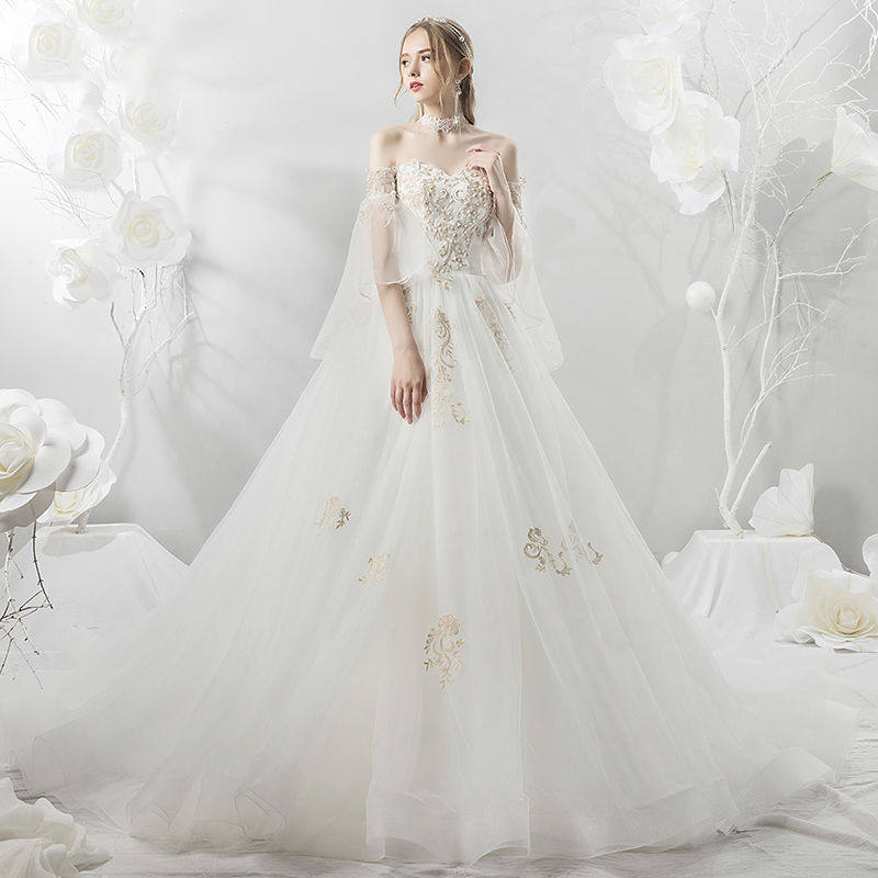 婚纱礼服2021新款春季拖尾韩版公主梦幻显瘦森系旅拍新娘婚纱简约