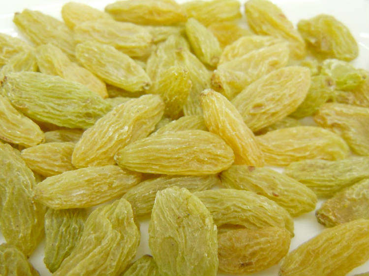 新货特级精选哈密王绿皇后26元500克无籽葡萄干.满两斤包邮