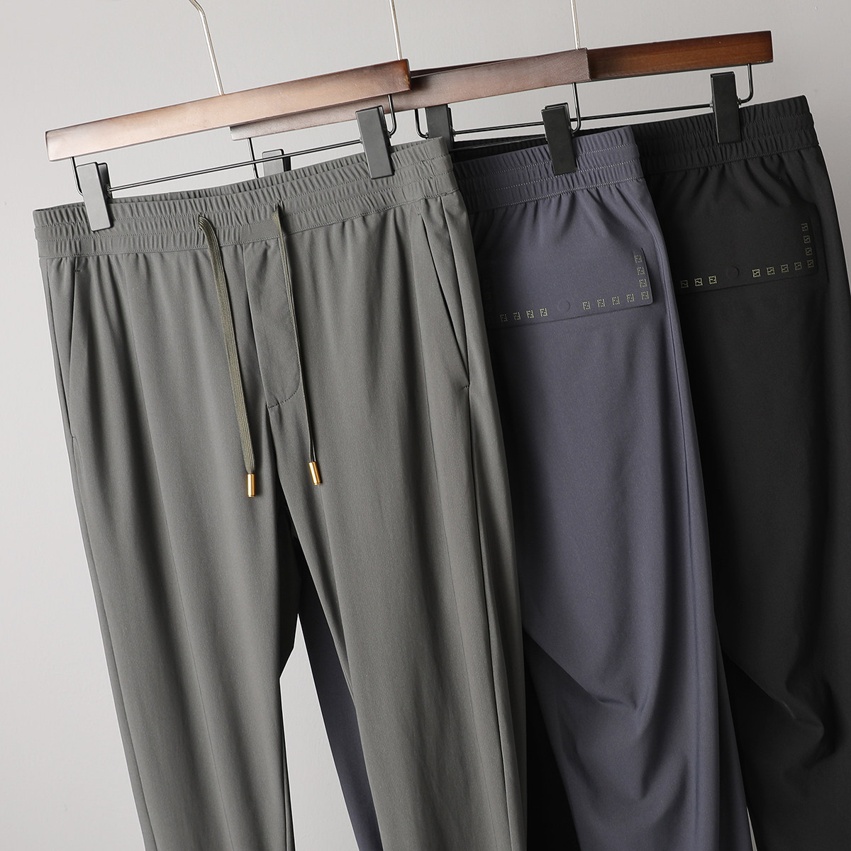 薄滑弹冰丝质感夏季男裤子高弹力修身免烫松紧腰抽绳压胶休闲裤男