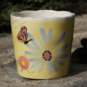 马卡龙色花盆图片