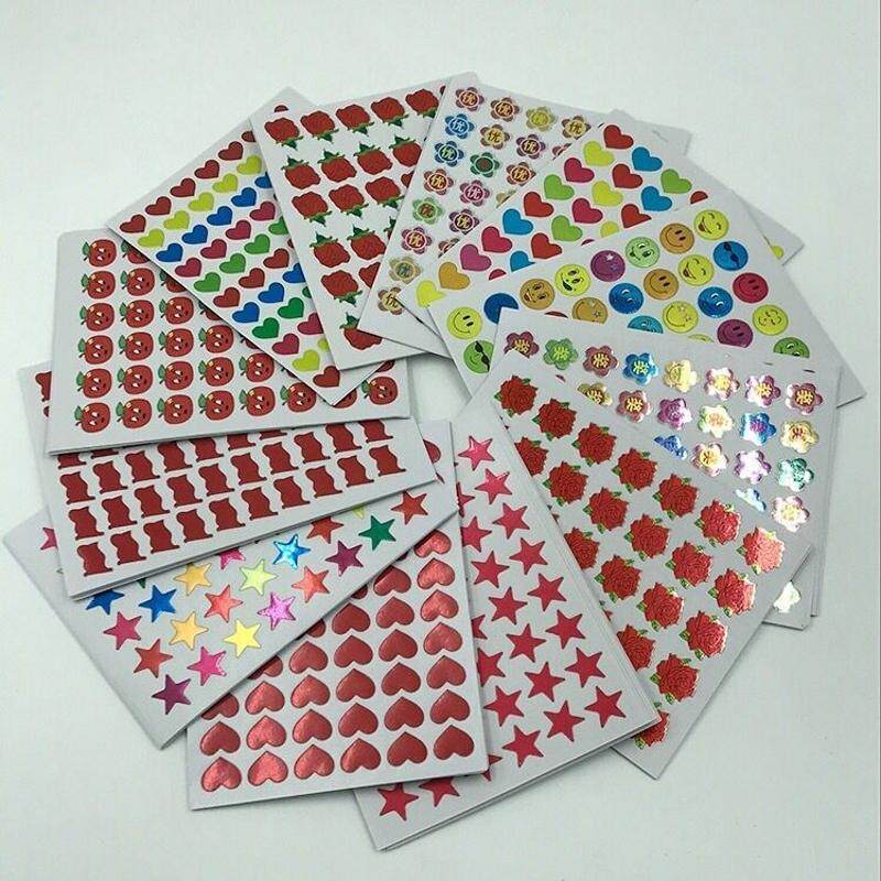 100张幼儿园儿童奖励贴纸苹果笑脸优奖字红旗小红花粘贴