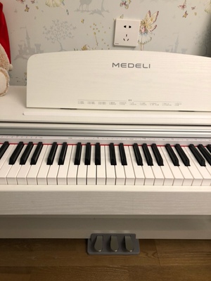 大家觉得美得理dp50电钢琴怎么样,这琴手感音质差不差呢?