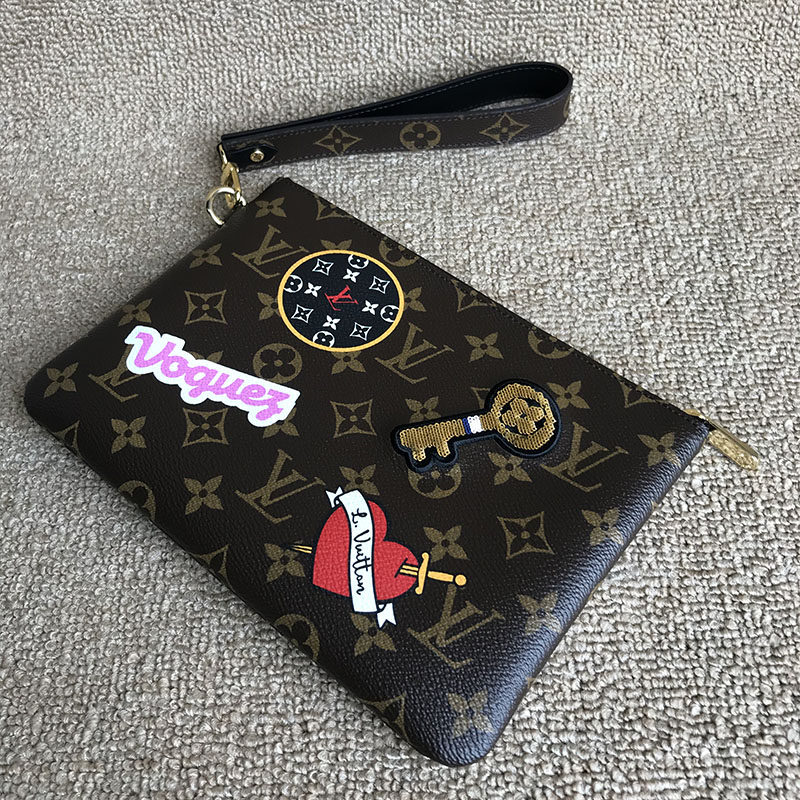 [9.9新]路易威登lv女士限量徽章款手拿包jm1338