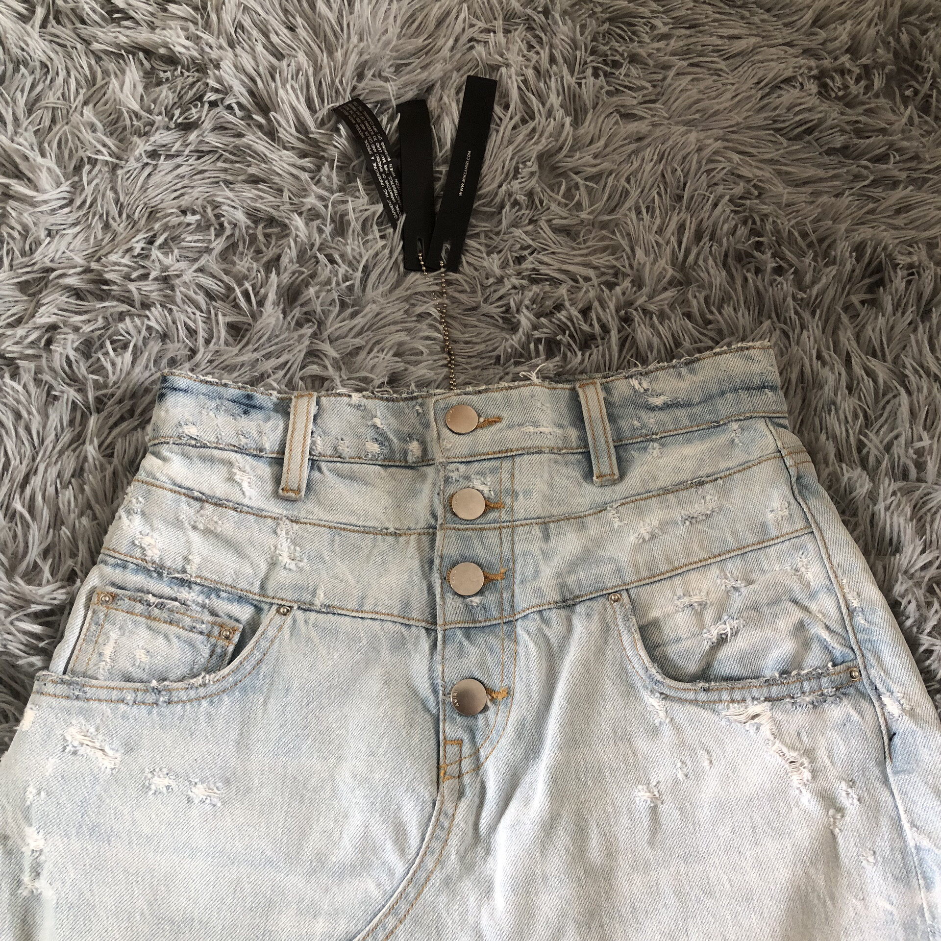 Amiri Light Blue Distressed Denim Skirt — front
