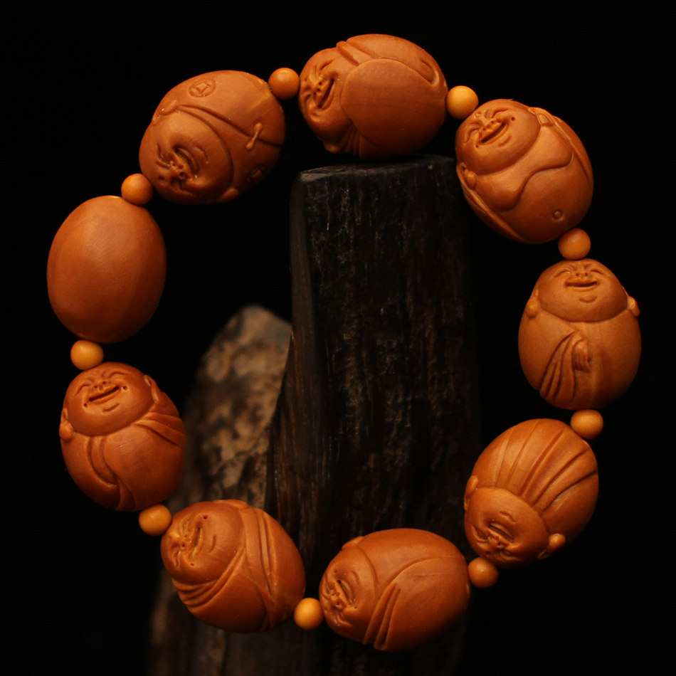舟山核雕村  【包衣童子】杨晓明工作室杨氏橄榄核雕刻手串单籽脖挂