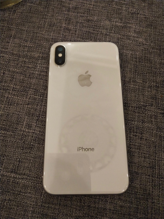 iPhoneX256G无维修使用痕迹轻一直带手机壳和