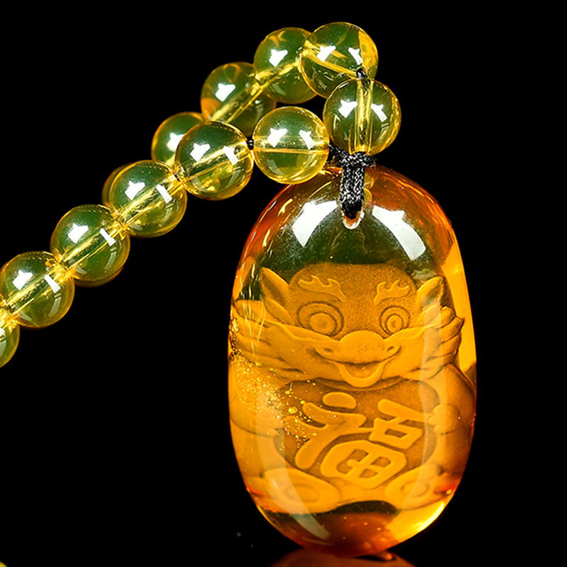 18.14克 净水级高蓝通透蓝珀阴雕福兽水滴形挂件 项链 强荧光