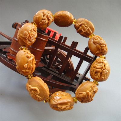 苏州舟山核雕老艺人朱红梅《浮雕全身十八罗汉》