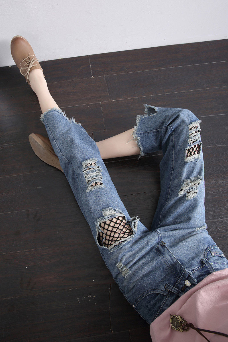 实拍破洞渔网牛仔裤女春夏季2017新款高腰不规则裤脚边九分裤