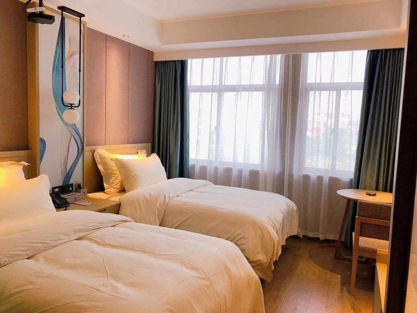 义乌市希岸酒店全释·和顺双床房 - 淘酒店专营店