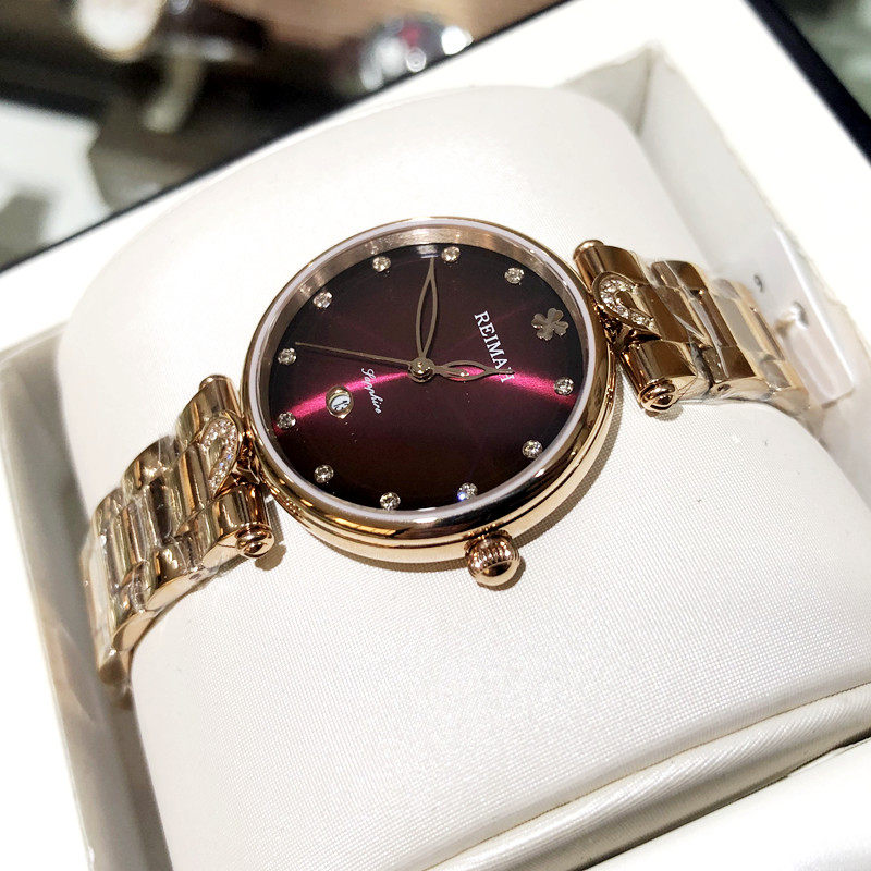 宝时捷新款手表女皮带玫瑰金蓝盘日历超薄防水石英表商务情侣表