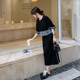 黑色牛仔拼接卫衣连衣裙女2025秋季新款高级设计感气质赫本风裙子