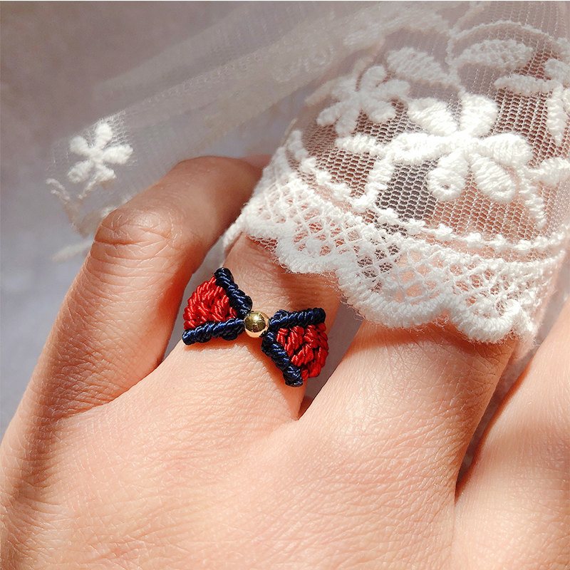 蝴蝶结转运珠戒指