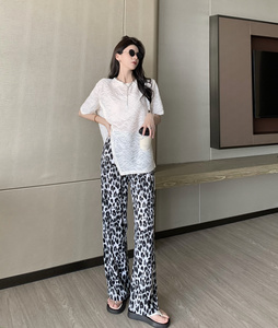 Hollow out solid color T-shirt loose split top + thin leopard print leisure wide leg pants