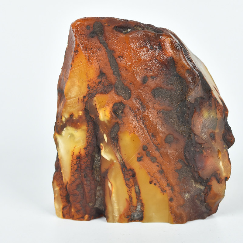 93.35克 【强荧光】大颗带皮鸡油黄蜜蜡随形原石摆件【0857】