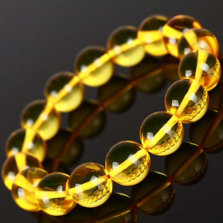 01克 12.5mm【强荧光】梦幻净透精美金珀手链 759360