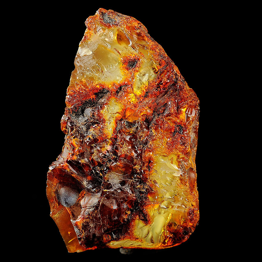 18.97克 随形琥珀蜜蜡赌料带皮原石【强荧光】