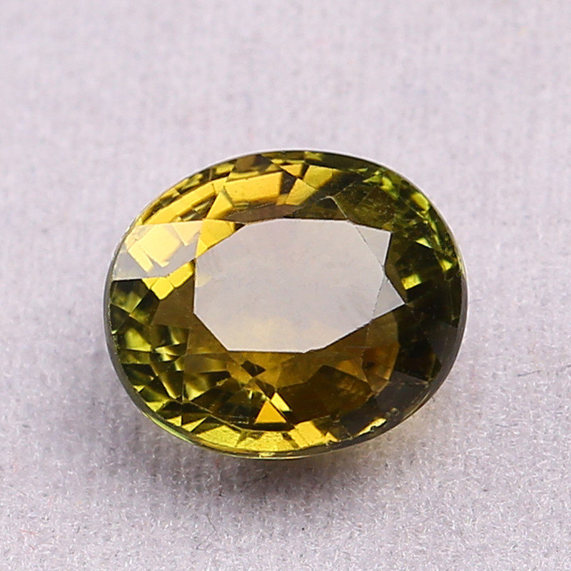 5.67克拉 天然全净黄绿色碧玺椭圆戒面 一流切工 火彩好