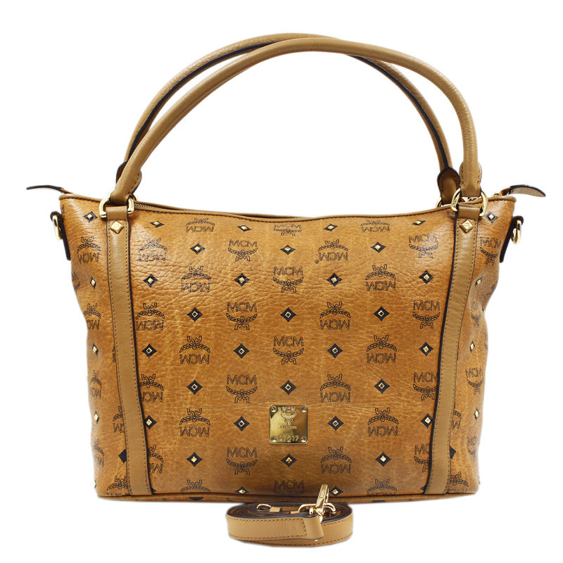 85新〕mcm 经典花纹女士饺子包手提包 可肩背