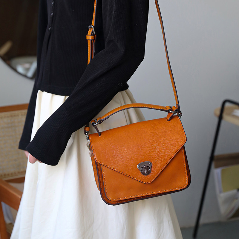 脱毒家 头层牛皮锁扣女包盖式小包真皮复古手提斜跨单肩包 包579