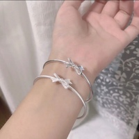 蝴蝶结手镯小众设计感钛钢镀银可爱少女风开口手链闺蜜礼物不掉色