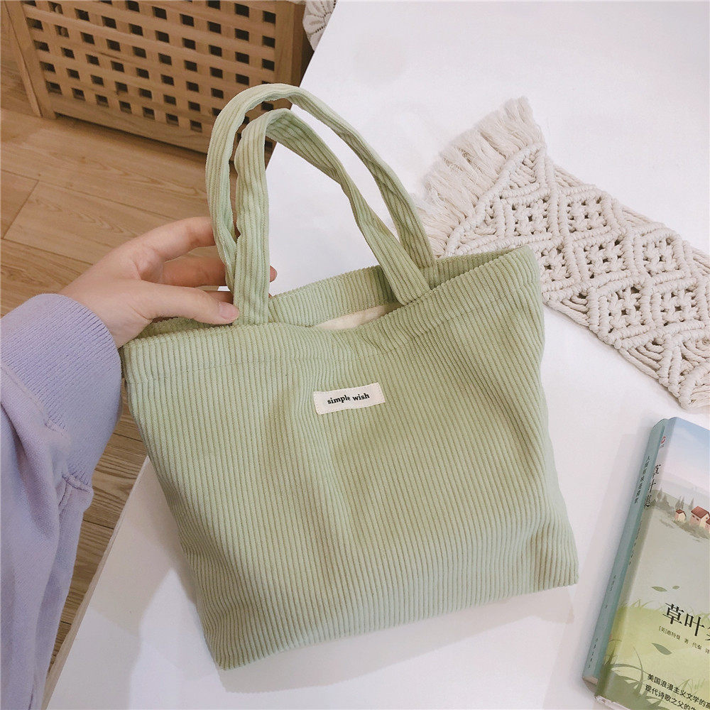 手提小布包上班