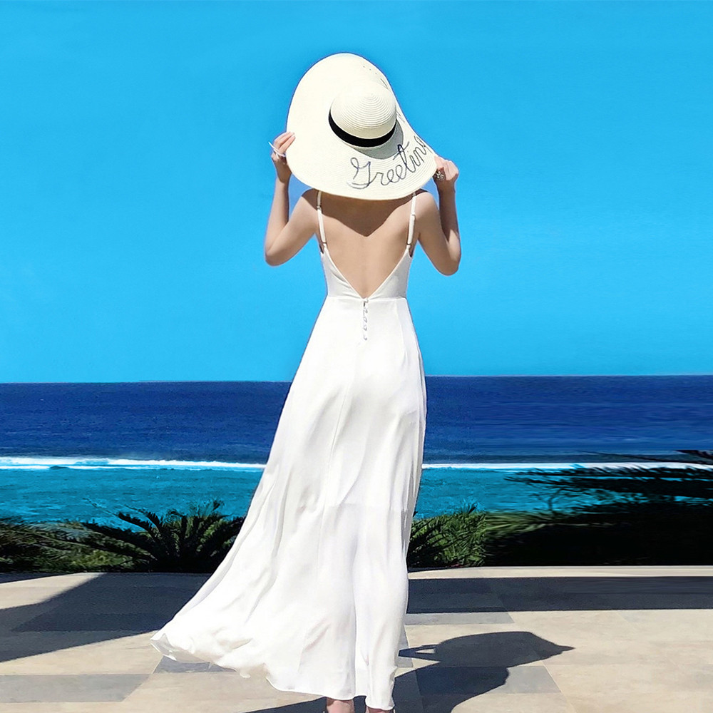 马尔代夫沙滩裙女海边度假旅拍超仙白色雪纺v领性感露背吊带长裙