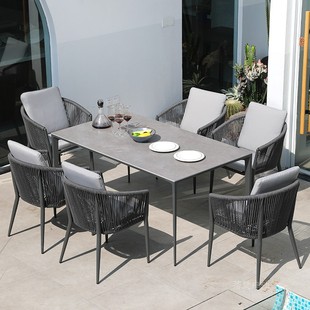 。北欧轻奢户外餐桌椅组合庭院花园设计师样板房露天烧烤桌防水藤