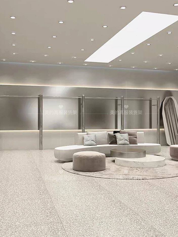 服装店装修不锈钢镜面银色大圆柱靠墙架上墙创意挂衣架网红展示架