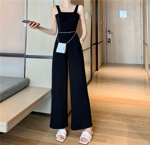 Real shooting summer seaside vacation sexy backless black thin hanging feeling one-sided shoulder strap wide leg Jumpsui