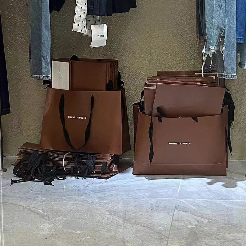 服装店手提袋纸袋定制购物女装包装礼品衣服鞋盒用高档咖啡色袋子