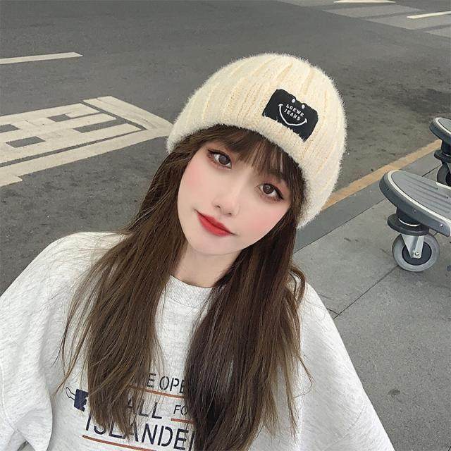 热卖针织毛贴冬耳线帽女脸加保暖护冬笑布日系加版潮帽韩子季绒秋