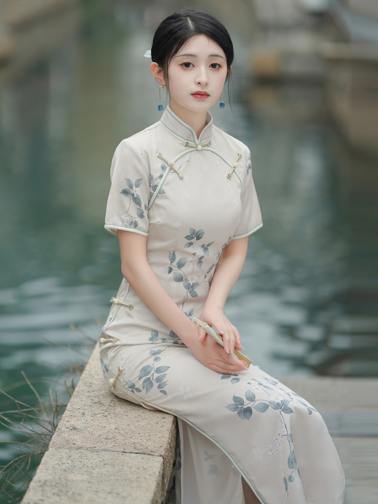 醋酸提花旗袍2023年夏季高端气质年轻款少女复古双襟素雅印花长款