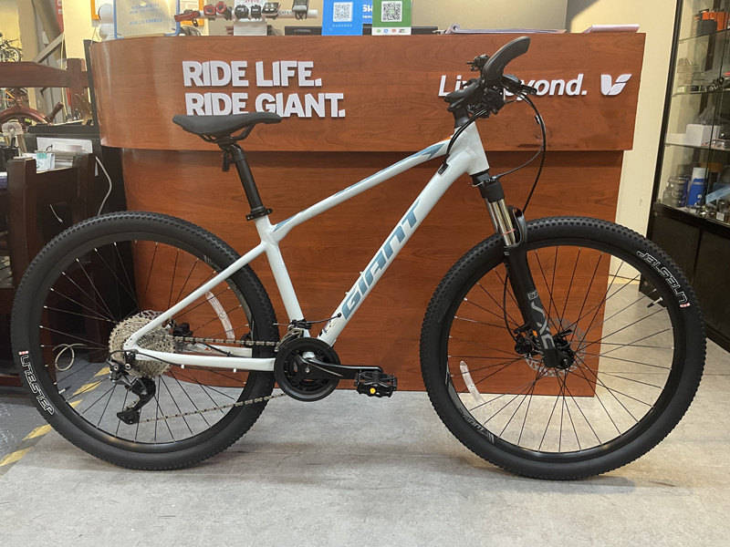 自行车山地车捷安特_捷安特atx860铝合金油压碟刹变速避震山地车27.