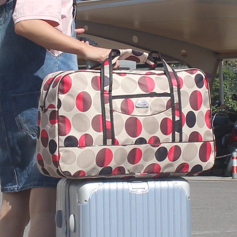 大容量女士手提旅行包出差行李包袋穿拉杆包防水单肩包男长短途包