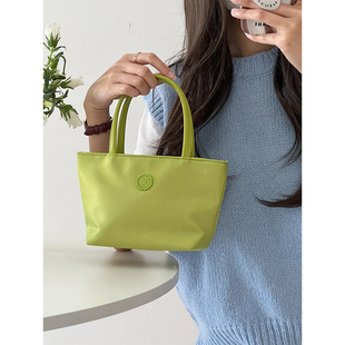 绿色简约小包包女春夏帆布手提包高级感2024年新款小众设计斜挎包