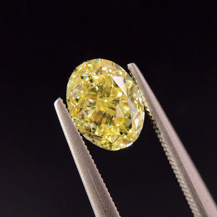 gia证书0.60克拉 颜色fy 净度si1 ex vg椭圆型天然黄钻可订制8182