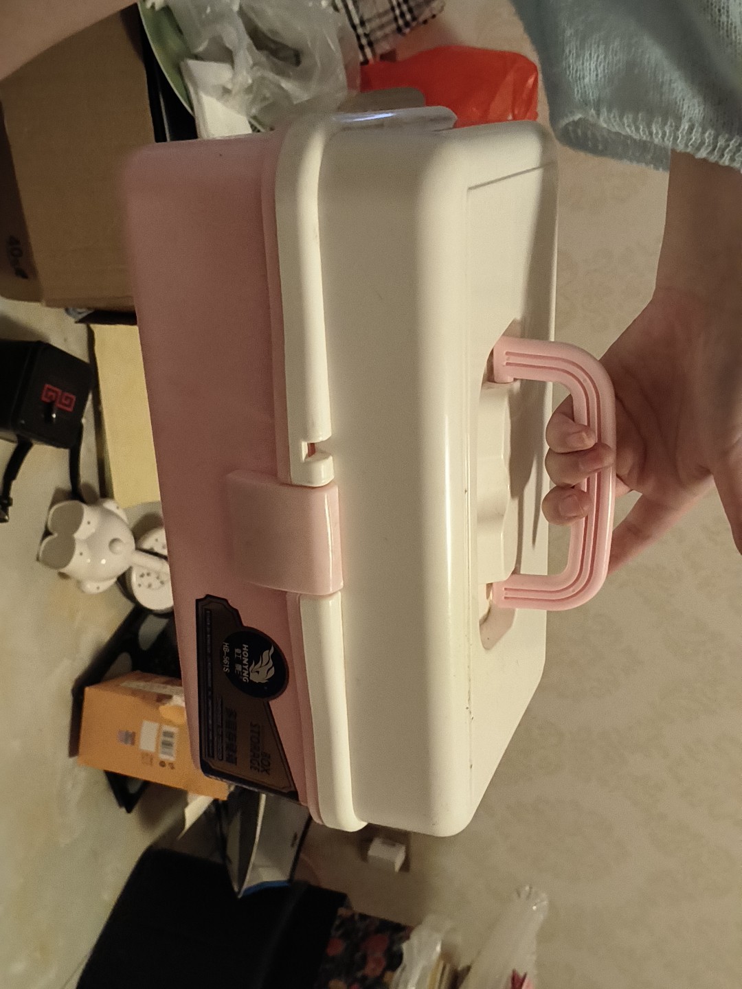 The pink three-storey collection box with the white shell with the pink suit with the transparent cap design. How much is inside?