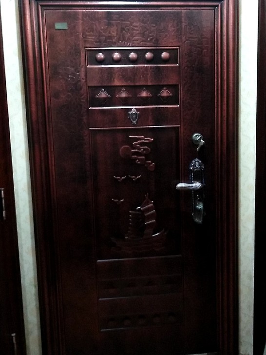 步阳安全门防盗门8公分丁级仿铜门双锁样品处理