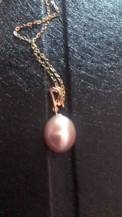 k金海水珍珠项链朋友在商场专柜买来送我的，看起来颜色光泽都