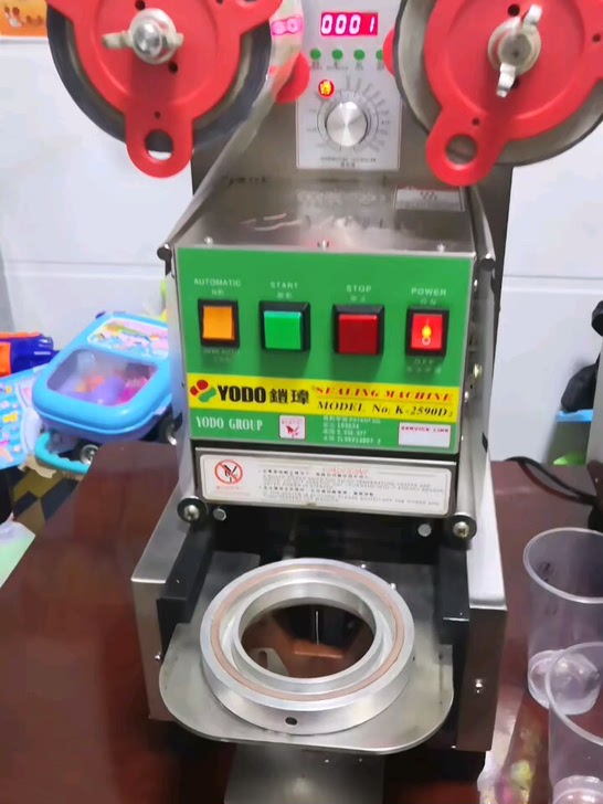 奶茶店设备铠玮乃士全自动封口机