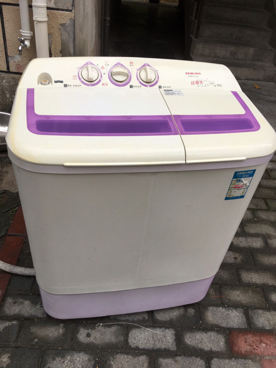 新乐洗衣机，成色如图，正常使用。6点5公斤。湖州市吴兴区碧波