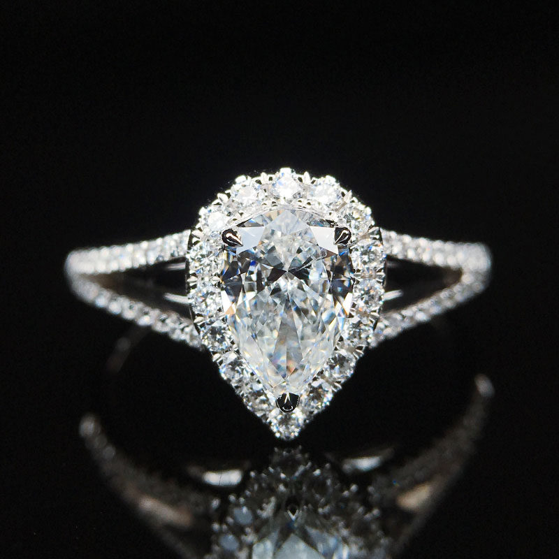 献和昌主钻 0.50克拉 颜色f 净度si2 18k金 水滴形 钻石戒指