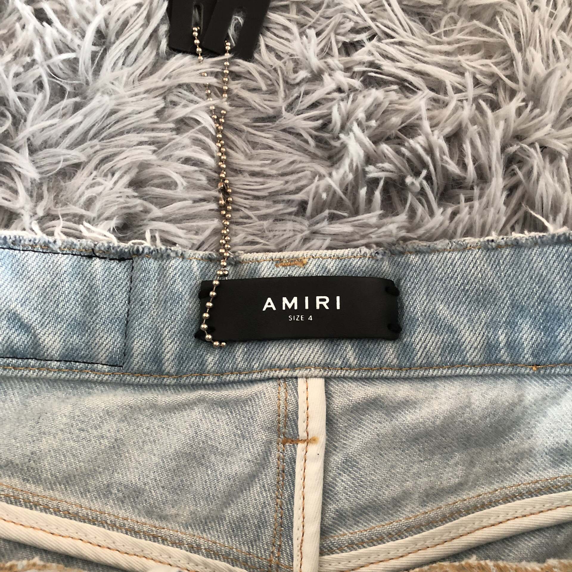 Amiri Light Blue Distressed Denim Skirt — detail