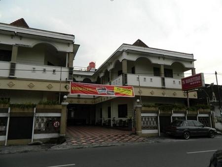 孟库育丹酒店