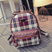 Fanciful 2015 collision riveted New England grid Backpack Backpack trend of the female Korean student bag