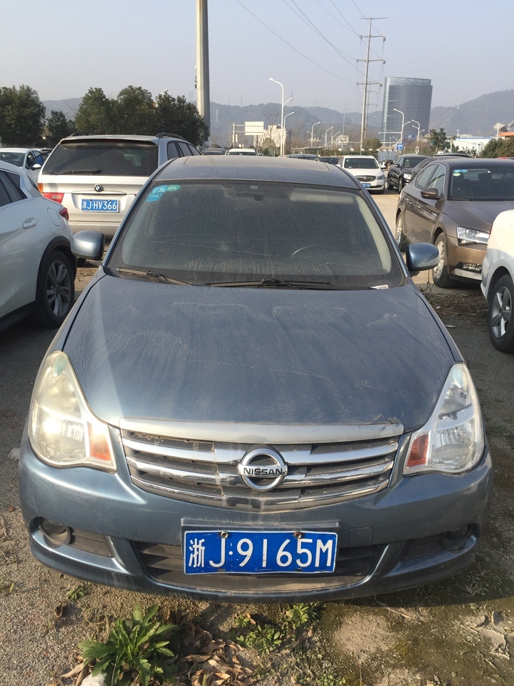 车牌号为浙j9165m轩逸牌小型轿车一辆