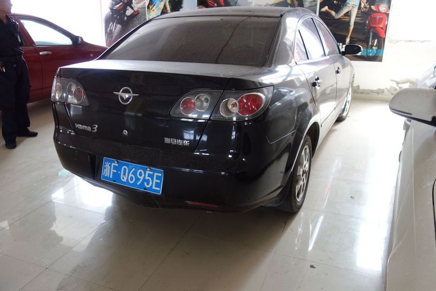 车牌号为浙fq695e海马牌hmc7185a小型轿车